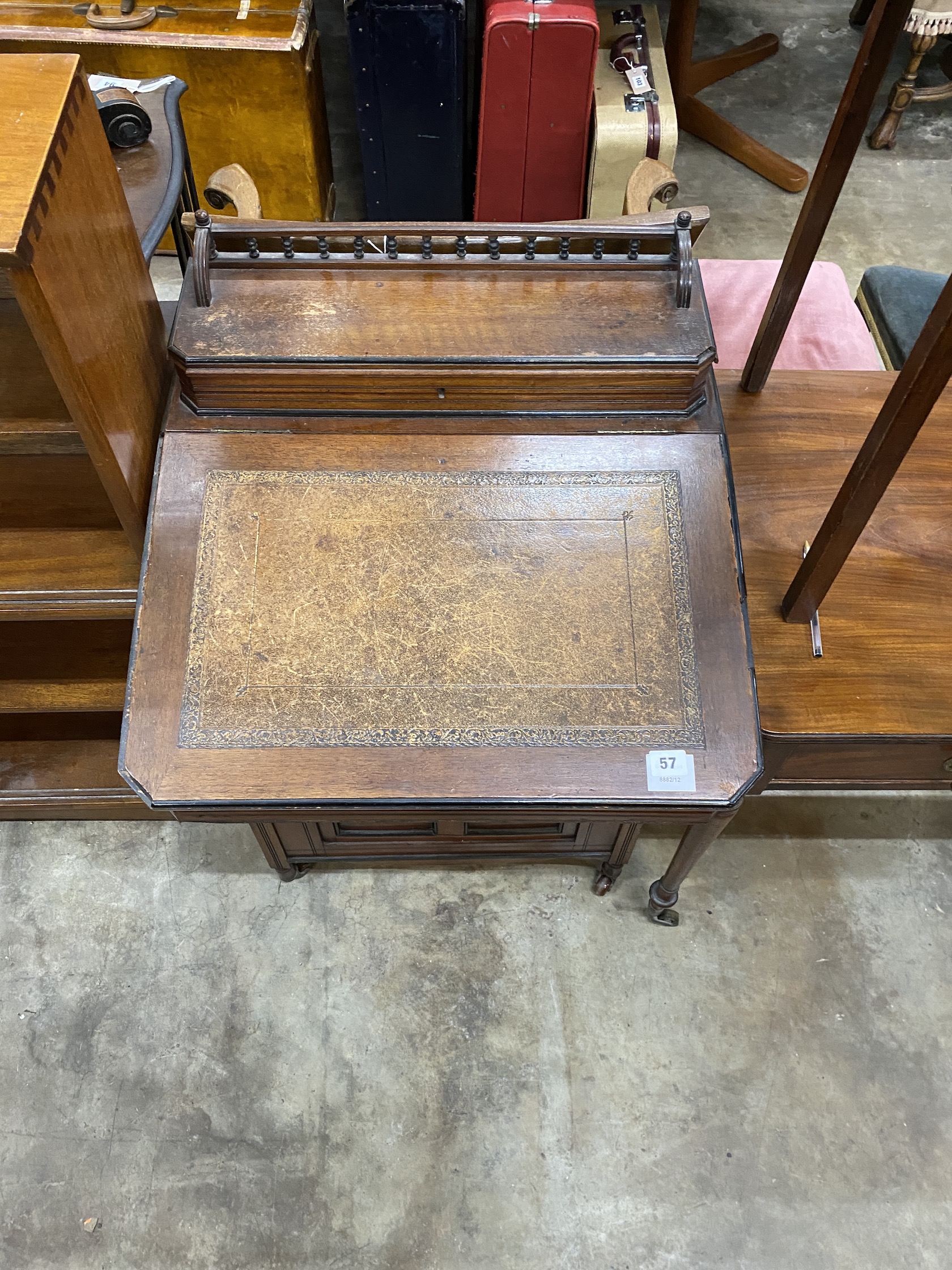 A late Victorian Aesthetic movement mahogany Davenport, width 56cm, depth 57cm, height 96cm